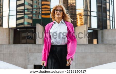 Transgender business woman lifestyle moments in downtown, Los angeles. Lgbt woman going to work at  the office. Representation of equality and working rights for the lgbtq+ community.
