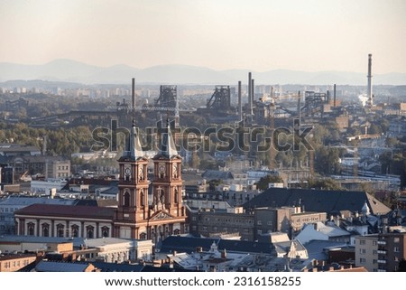 Landscape of Ostrava city and industrial Vitkovice district with Katedrala Bozskeho Spasitele cathedral Royalty-Free Stock Photo #2316158255