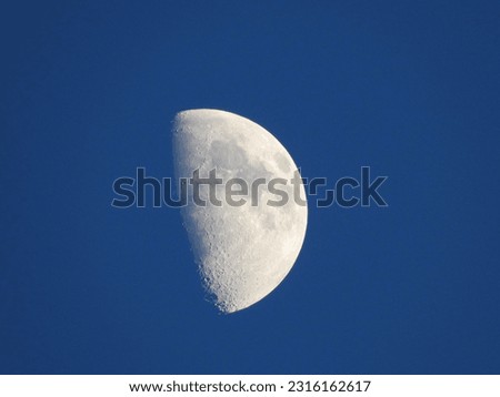 half moon with blue sky background
