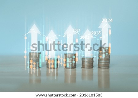 A towering stack of coins on a wooden desk represents essence of business and finance, highlighting significance of saving, managing money, and making wise investment decisions. Growing graph concept