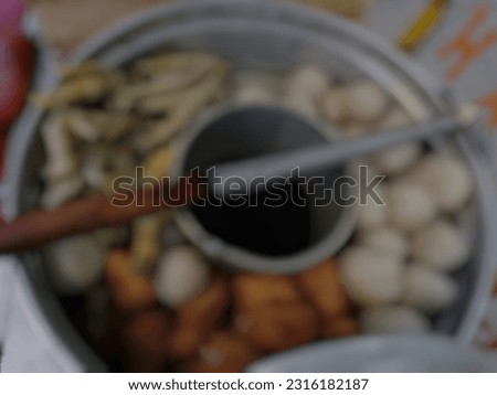 traditional snacks made from starch and peanut sauce and tofu,blur background with bokeh image