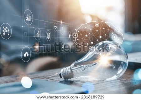lightbulb, idea, strategy, creativity, information, network, knowledge, solution, imagination, creative. light bulb put on table side of cup. a round that has idea strategy creativity information. Royalty-Free Stock Photo #2316189729