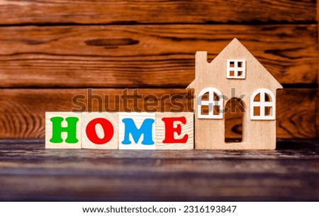 Wooden home and text on the cubes home
