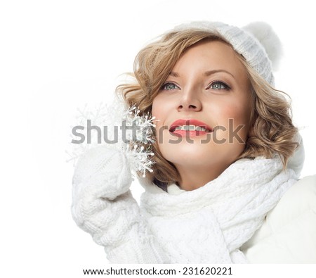 portrait of attractive young caucasian woman  toothy smile  face skin care in warm clothing  studio  shot isolated on white smiling winter snowflake