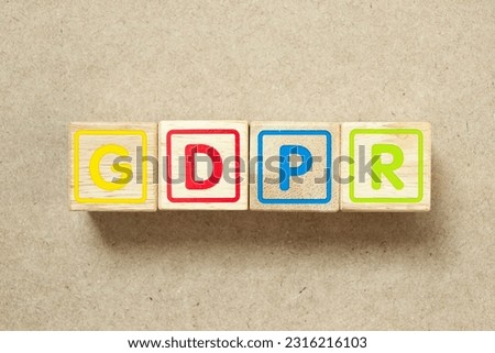 Wooden alphabet letter block in word GDPR (General Data Protection Regulation) on wood background