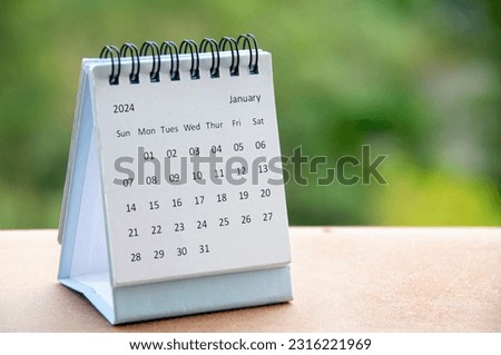 January 2024 white table calendar with customizable space for text. Copy space. Royalty-Free Stock Photo #2316221969