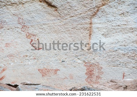 Abstract human art at Pha Taem prehistoric cliff painting which 