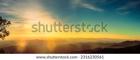 Panorama view of the mountains in Landscape picture.  Highest mountain in Chiangmai, Thailand. Beautiful panorama of Chiangmai, Thailand in sunny day. Beautiful mountains with white fog in panorama