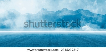 Dark street, asphalt abstract dark blue background, empty dark mountain range scene, with smoke mist cold white float up for display products Royalty-Free Stock Photo #2316239617