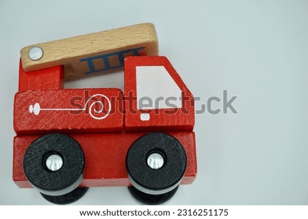 Wooden toy red fire engine