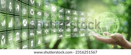 Illustration for environmental, business or green investment concepts. Virtual screen with icons on green background use for ads or web banners or whatever. Leave spaces to enter text. Royalty-Free Stock Photo #2316251567