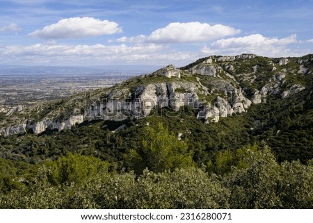 Massive rock formation in the Alpilles (Provence, France) on a sunny day in springtime Royalty-Free Stock Photo #2316280071