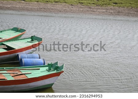 Boats on a river bank