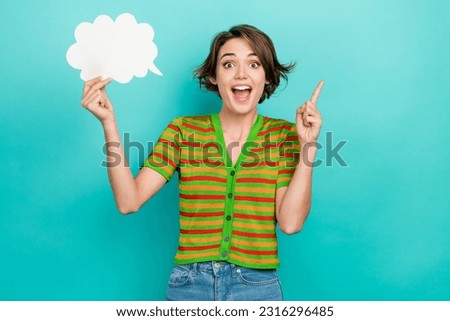 Photo of clever positive girl hold empty space cloud bubble card point finger isolated on teal color background Royalty-Free Stock Photo #2316296485