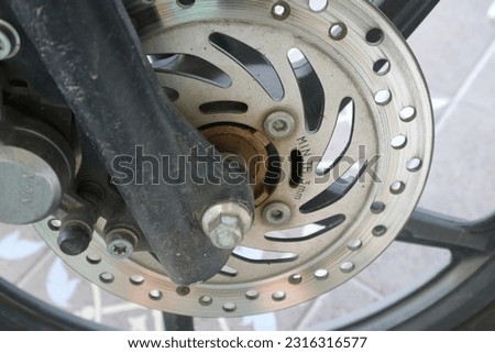 Detail of the system of brakes in a modern motorcycle.