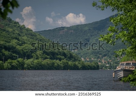 Valley of river Labe in sunny hot day near Brna nad Labem big village