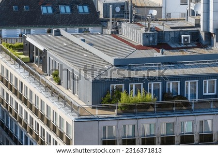 It is penthouse on modern Vienna bilfing. It is a terrace on grey house.  Royalty-Free Stock Photo #2316371813