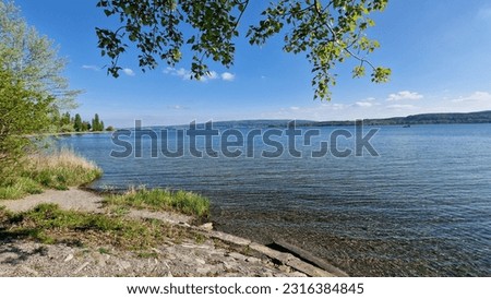 Summer vacation on beautiful Lake Constance with blue sky and sunshine