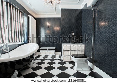Photo of modern white and black bathroom