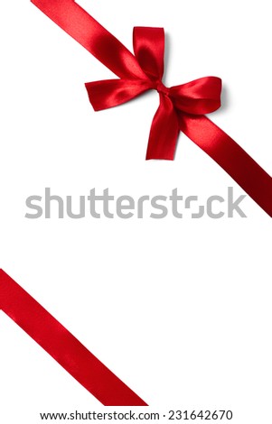 Shiny red satin ribbon on white background. studio shot