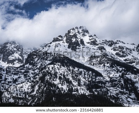 Mountain peak with snowcaps in Wyoming Royalty-Free Stock Photo #2316426881