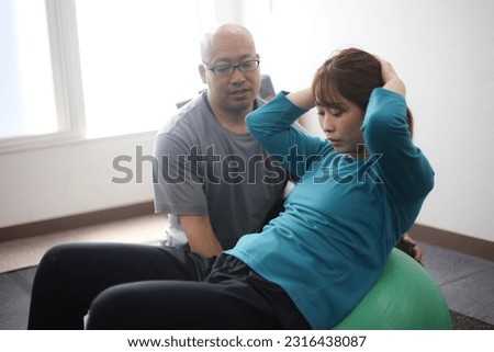 Image of a woman receiving personal training
