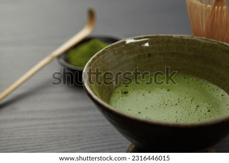 Japanese traditional matcha tea on wood background Royalty-Free Stock Photo #2316446015