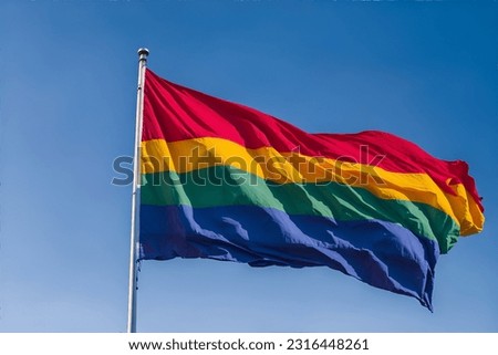 A Pride rainbow colored flag
