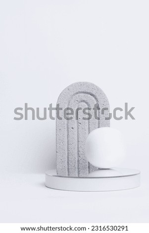 Abstract minimal geometrical form. Round podium pedestal, white sphere and geometric form on white background. Scene to show products