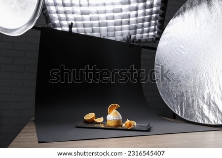 Beautiful composition with delicious dessert on black background in studio. Food photography