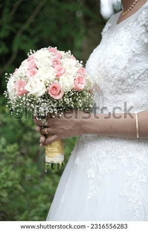 bride with bouquet, close hand