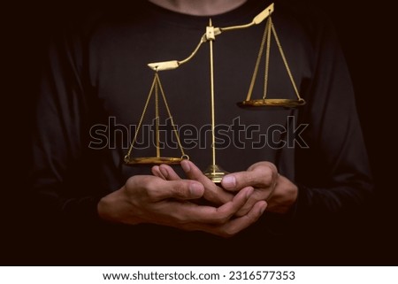 Lawyer's hand concept Justice  with Judge gavel, Businessman in suit or Hiring lawyers in the digital system. Legal law, prosecution, legal adviser, lawsuit, detective, investigation,legal consultant.