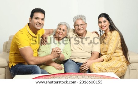 Indian sweet happy family at home Royalty-Free Stock Photo #2316600155