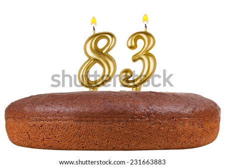 birthday cake with candles number 83 isolated on white background