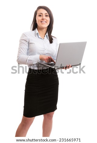 Cute businesswoman with laptop