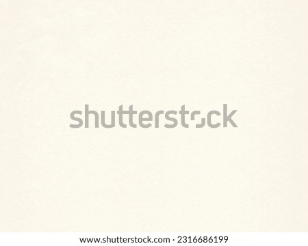 Textured pale beige coloured creative uncoated paper background. Extra large highly detailed image of empty sheet of natural paper.