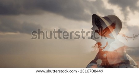 Double exposure. woman and free bird enjoying nature on sunset background, release, freedom, spiritual, free, independence, happy, pray, concept Royalty-Free Stock Photo #2316708449