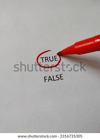 Make a choice. Choosing True instead of False. More selected with red marker.