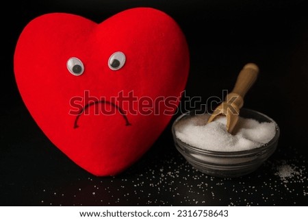 sad heart with a cup of sugar unhealthy sugars concept