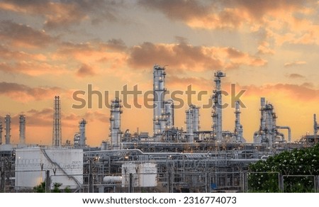 Oil and Gas Industrial zone,The equipment of oil refining,Close-up of industrial pipelines of an oil-refinery plant,Detail of oil pipeline with valves in large oil refinery. Royalty-Free Stock Photo #2316774073