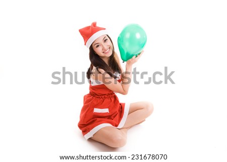 Santa woman holding a green balloon isolated on white background 