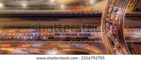 Expressway top view, Road traffic an important infrastructure, Drone aerial view fly in circle, traffic transportation, Public transport or commuter city life concept of economic and energ, transport. Royalty-Free Stock Photo #2316792705