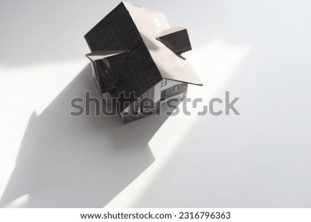 Colorful cardboard toy house isolated on white with clipping path 