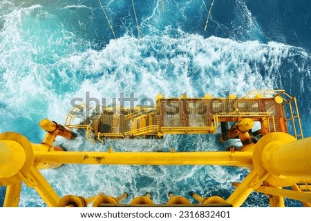 Offshore construction platform for production oil and gas. Oil and gas industry and hard work. Production platform and operation process by manual and auto function from control room. Royalty-Free Stock Photo #2316832401