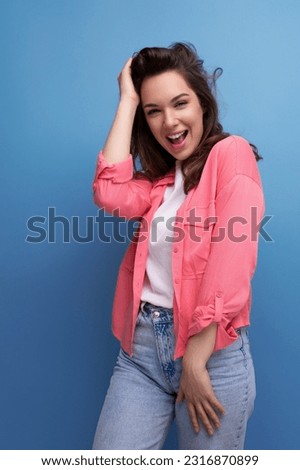 portrait of well-groomed european woman in casual look isolated with studio background