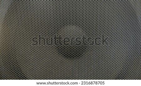 Abstract color plastic metal surface of a big speaker background