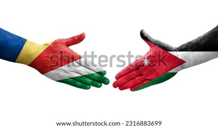 Handshake between Jordan and Seychelles flags painted on hands, isolated transparent image.