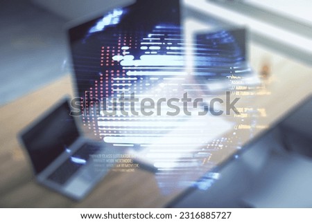 Double exposure of abstract creative programming illustration with world map and modern desk with computer on background, big data and blockchain concept