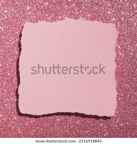 Pastel pink greeting card against glitter background, creative copy space. 
