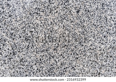 Rough textured granite countertop. Background or backdrop. Design blank or graphic resource